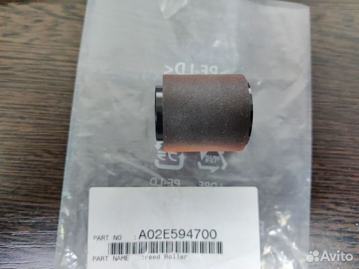 A02E594700 Ролик захвата бумаги Konica Minolta