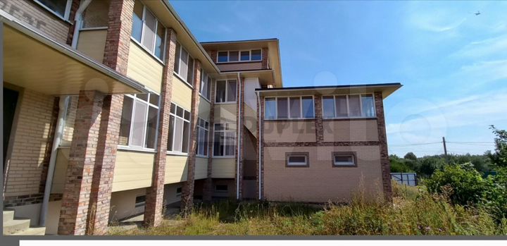 Коттедж 930 м² на участке 20 сот.
