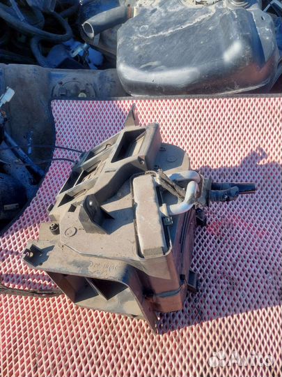 Радиатор печки Mitsubishi Carisma