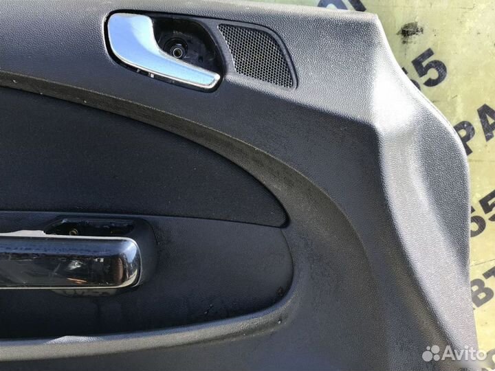 Обшивка двери передней левой Opel Corsa D