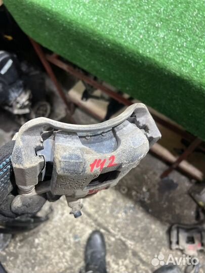 Суппорт тормозной передний левый Chevrolet Aveo 1