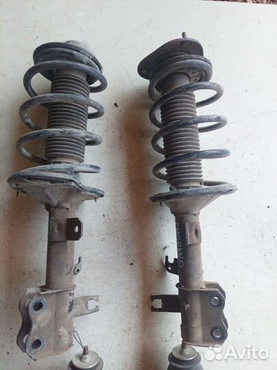 Стойки амортизаторы на geely emgrand