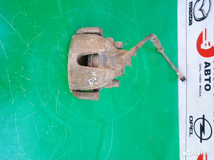 Суппорт тормозной передний Ford Focus 2