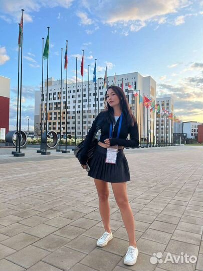 Тренер по большому теннису