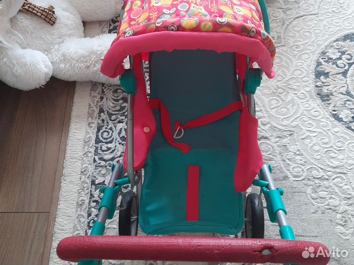 Игрушечная коляска для кукол