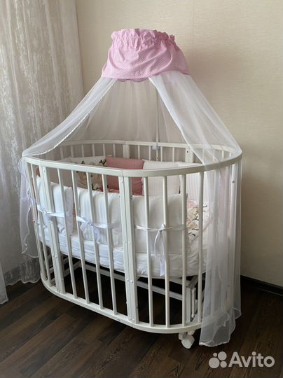 Детская кроватка трансформер с маятником