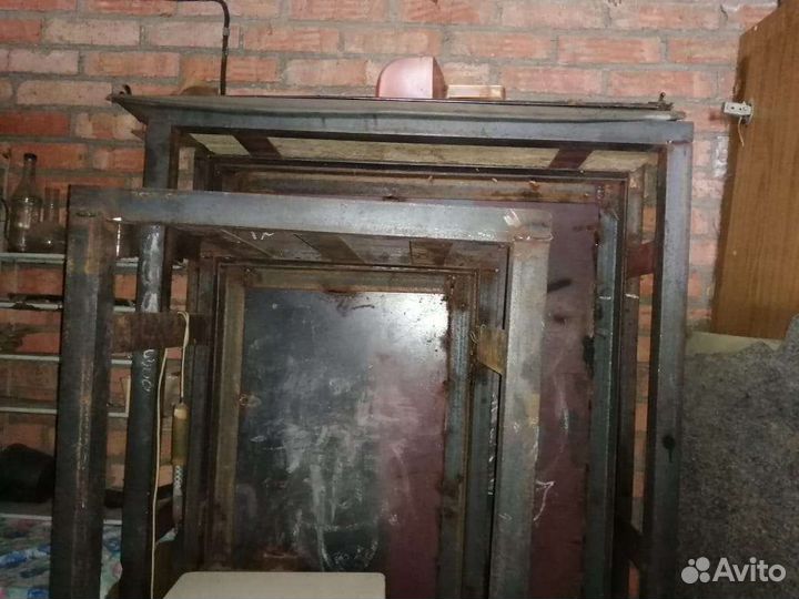 Двери железные в рамме