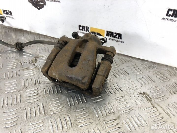 Суппорт задний левый L Land Rover Freelander