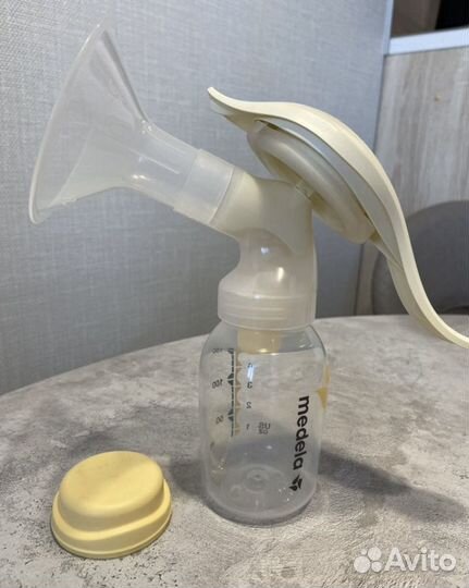 Молокоотсос medela ручной