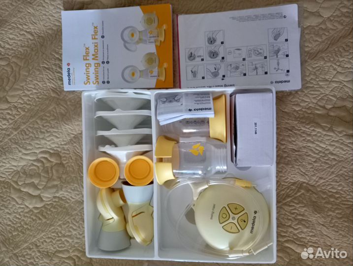 Молокоотсос medela электрический