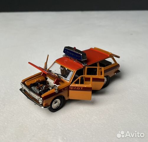 Модель автомобиля 1:43 Волга Газ 2402 эскорт