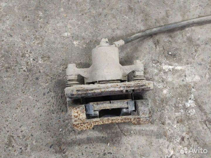 Kia Sportage 3 суппорт задний правый