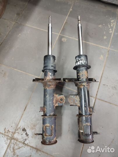 Стойка амортизатора передние Хендай Солярис