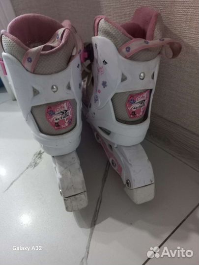 Роликовые коньки