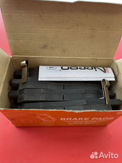 Колодки тормозные дисковые передние Nisshinbo