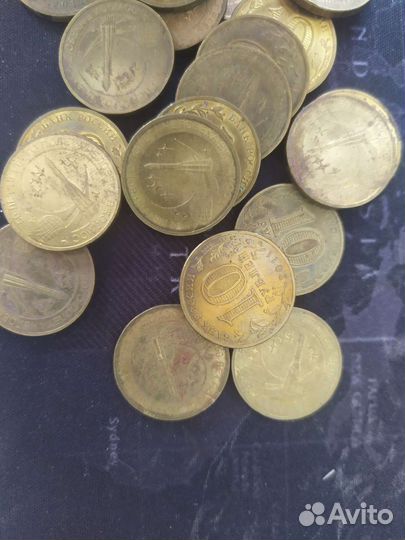 Монеты 50 лет первого полёта в космос