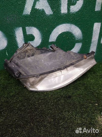 Фара левая Ford Focus 1