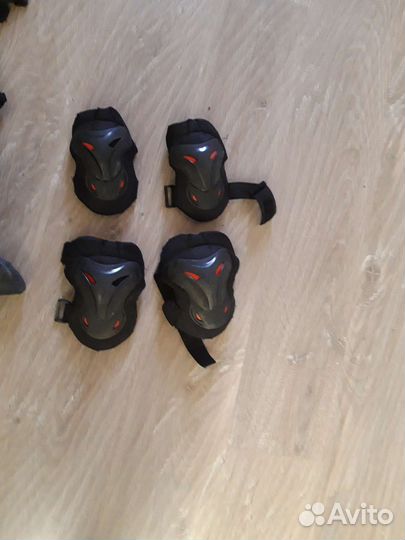 Роликовые коньки