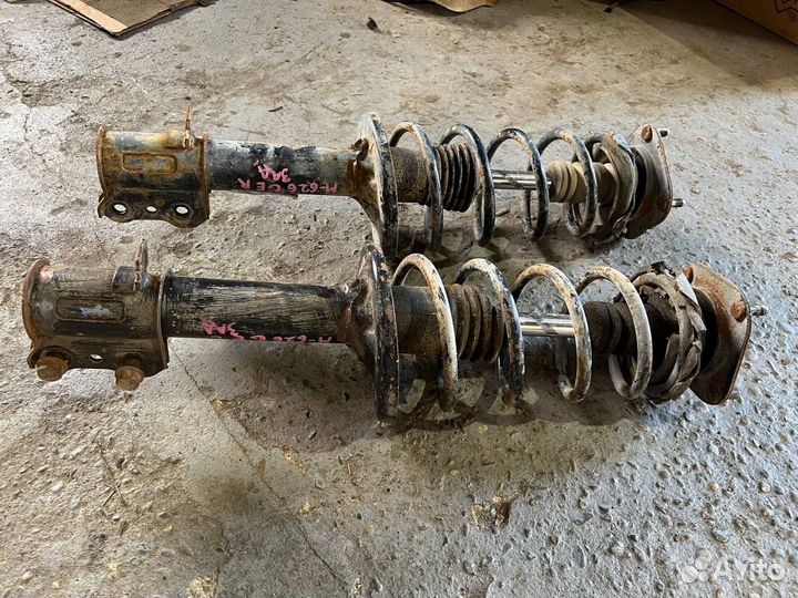 Стойка амортизатора задняя Mazda 626 GE