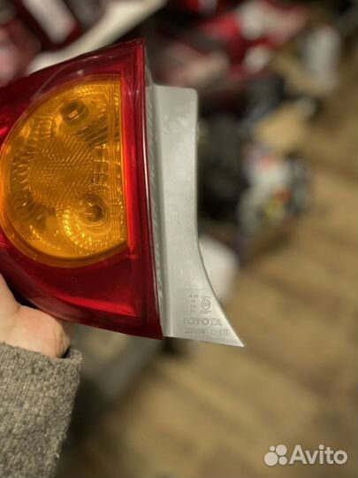 Фонарь задний левый Toyota Corolla E150