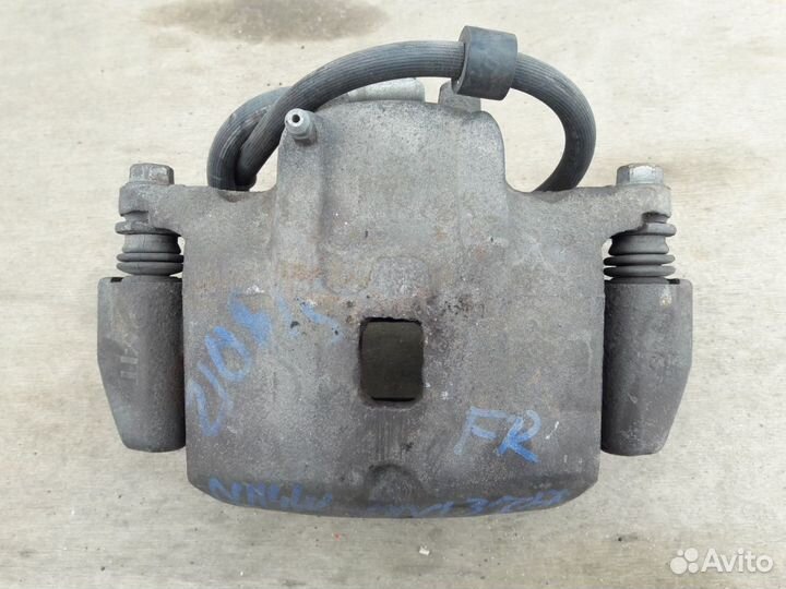 Суппорт тормозной передний Mitsubishi Grandis