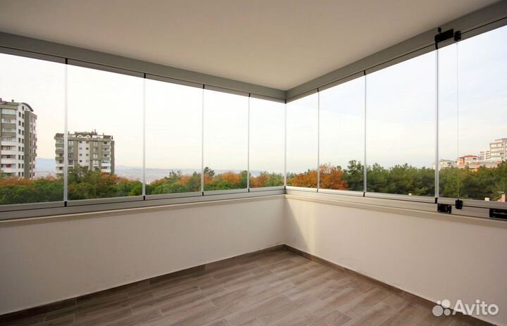 Безрамное раздвижное остекление