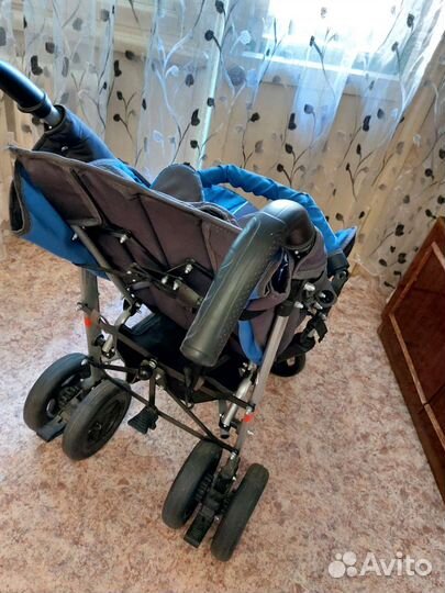 Детская инвалидная коляска для дцп