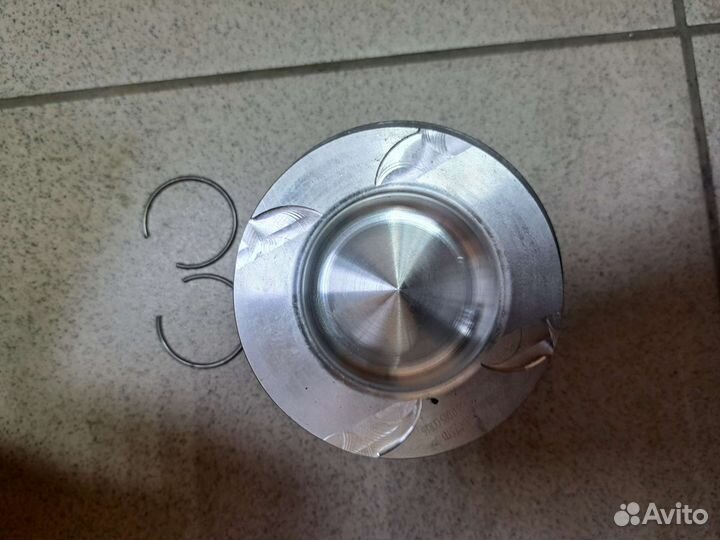 Поршень двигателя