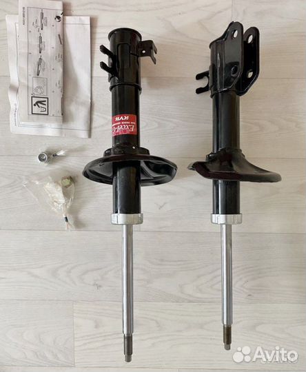 Стойки амортизатора Каяба оригинал 332505, 332504