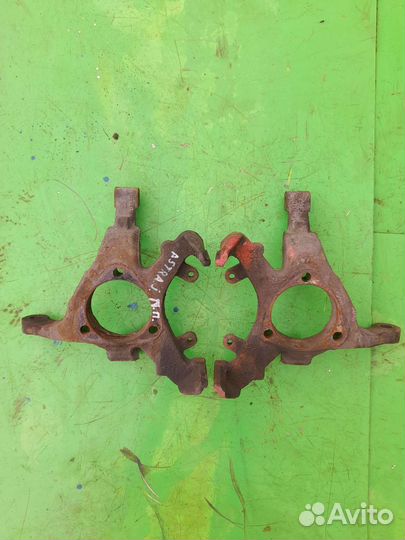 Передний поворотный кулак Opel Astra G