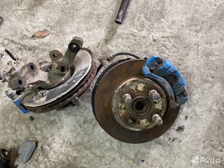 Поворотный кулак Mitsubishi Lancer 7