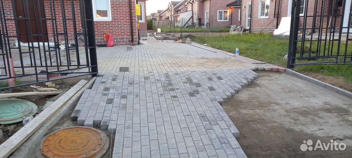 Укладка тротуарной плитки. брусчатка