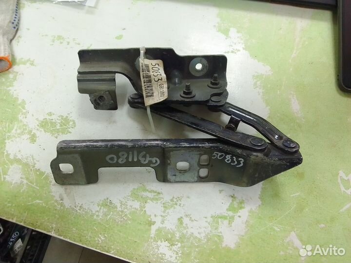 Петля капота Opel Astra J