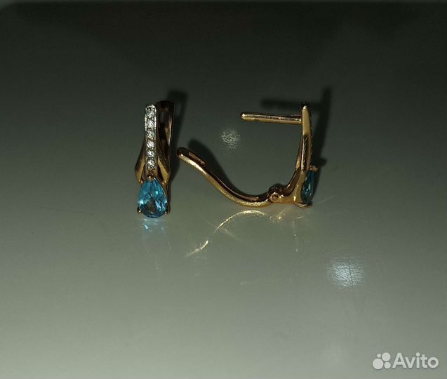 Золотые серьги 585 пробы с топазами