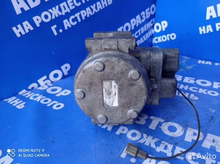 Компрессор кондиционера Mazda Familia B6 1990