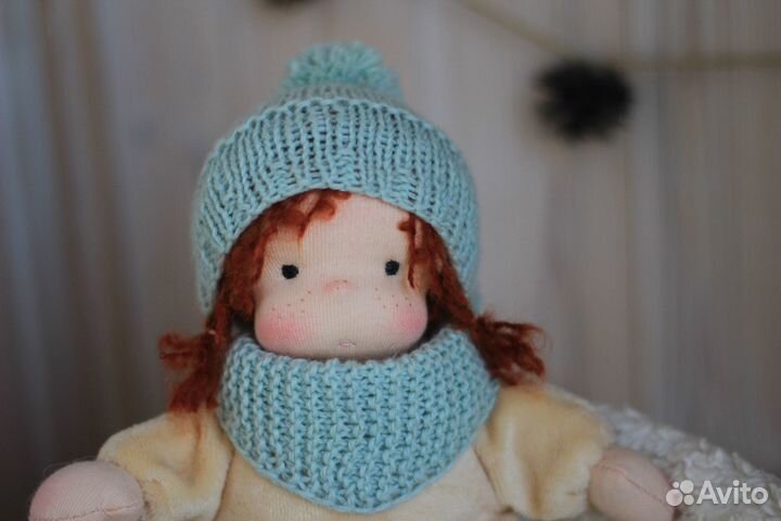 Текстильная кукла в пришивном комбинезоне