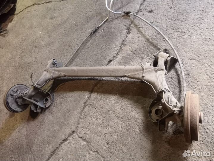 Балка задняя в сборе под барабаны Skoda Rapid Polo