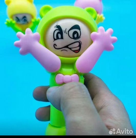 Игрушка, меняющие при нажатии,выражение лица