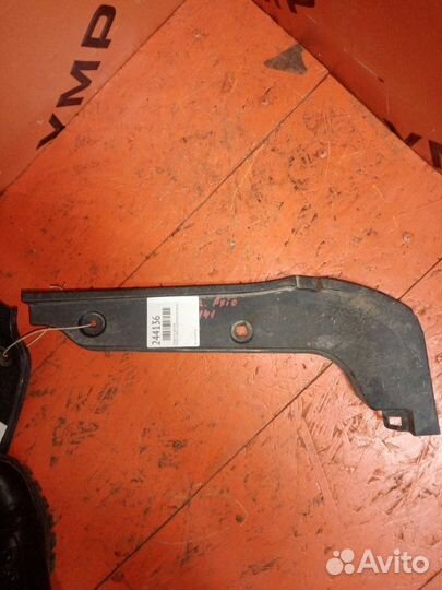 Подкрылок задний левый Toyota Corolla Axio NZE141