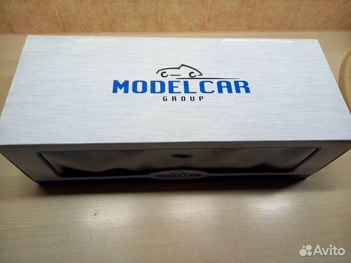 Коробка с машинкой