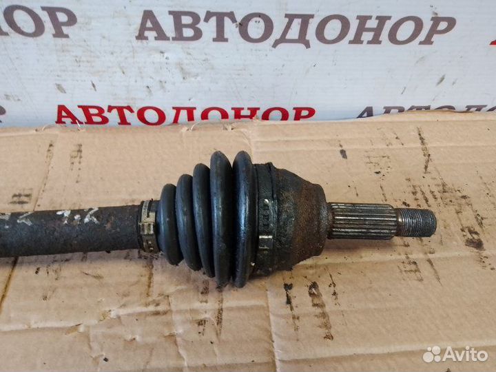 Полуось привод передний левый Mazda 2 1.25