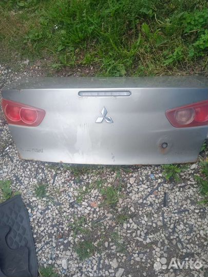 Крышка багажника митсубиси лансер 10