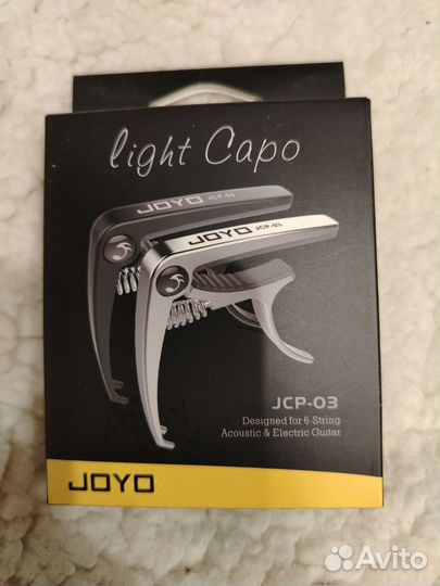 Ремень и каподастр для гитары