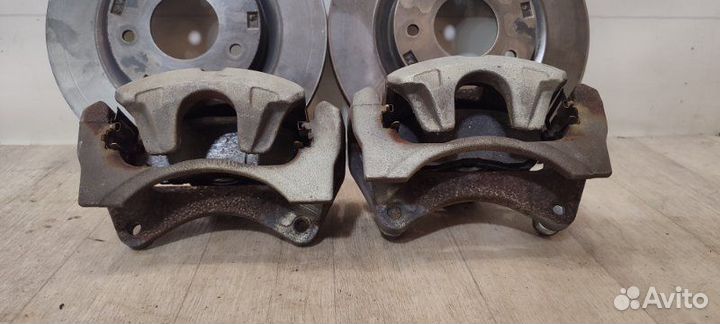 Суппорта и диски передняя Mitsubishi Lancer 10