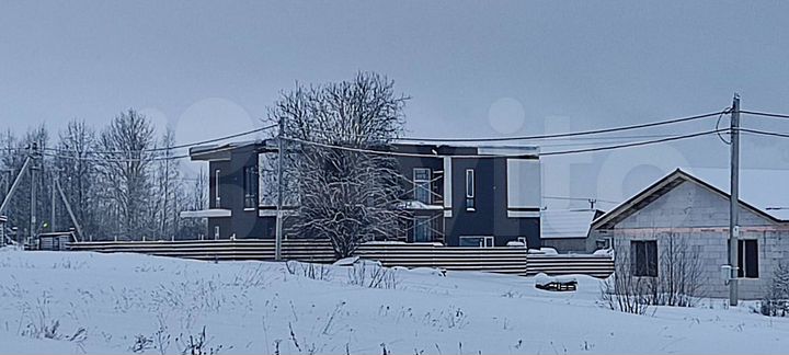 Коттедж 311 м² на участке 18 сот.