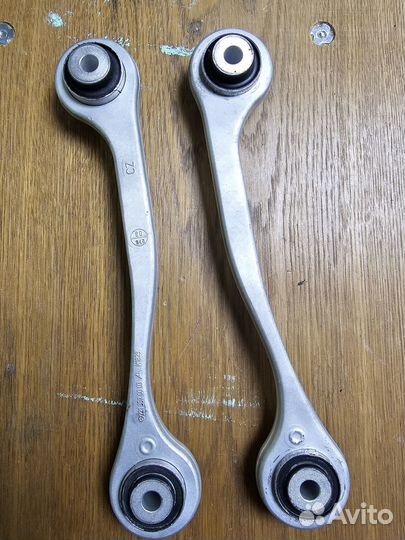 Тяги сходжения задней подвески 221