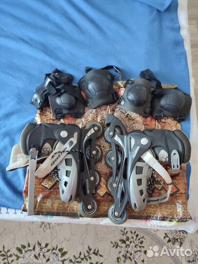 Роликовые коньки