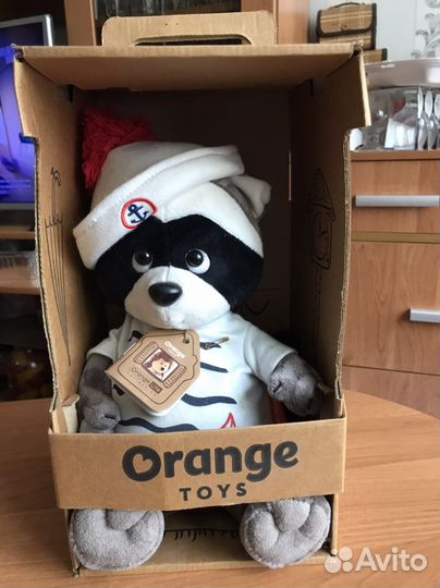 Игрушка енот