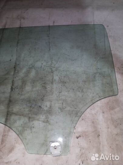 Стекло боковое заднее левое Mazda 3