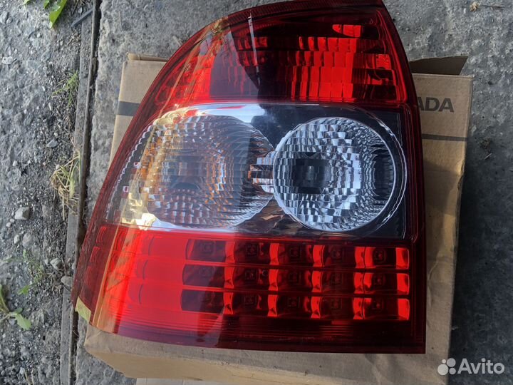 Стопарь левый Priora 2 (оригинал)